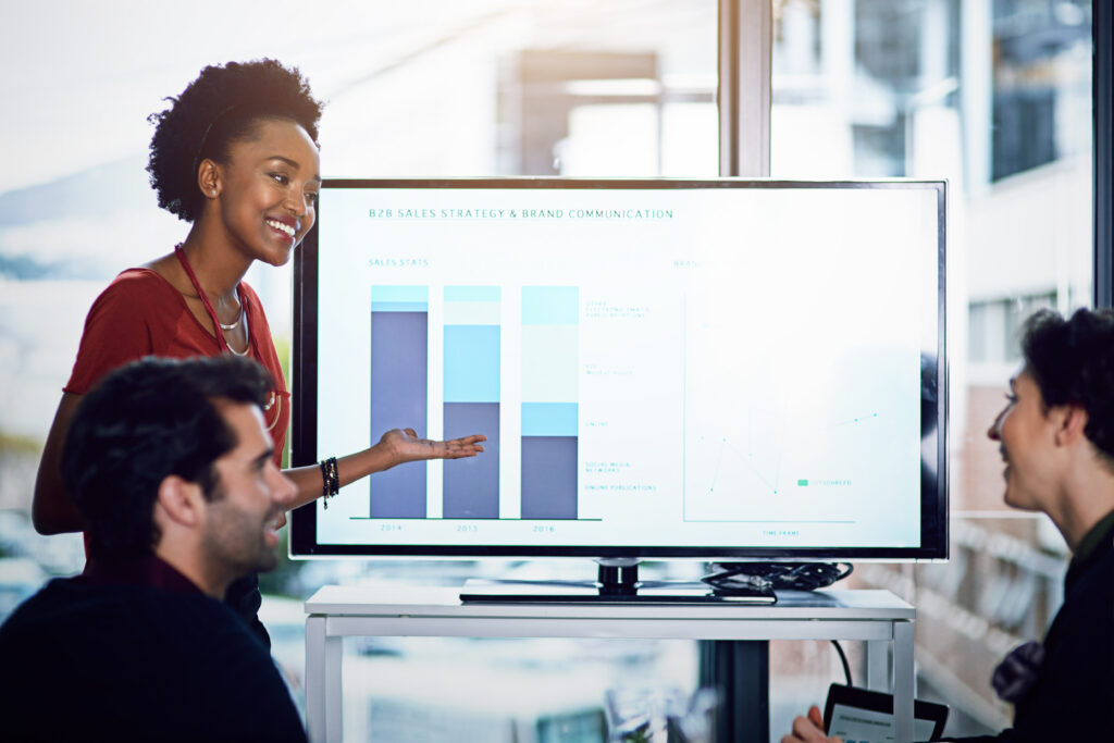 Sales team analyzing consumer data